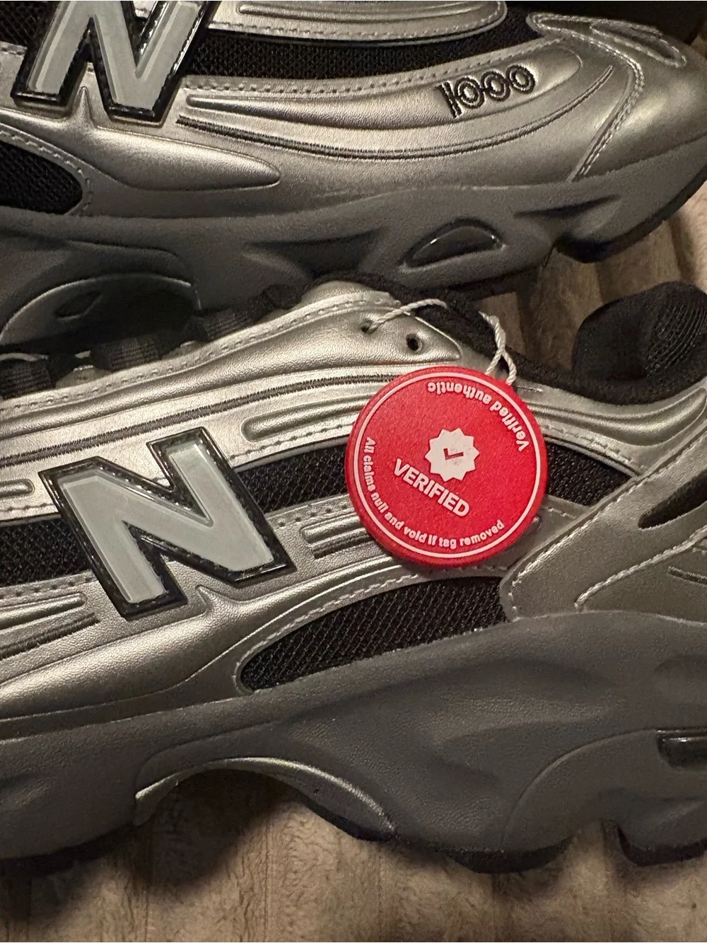 New Balance metallic silver